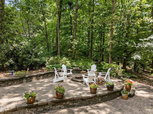 8004 Gabriels Bend Dr, Raleigh, NC 27612 - view of patio / terrace with an outdoor fire pit