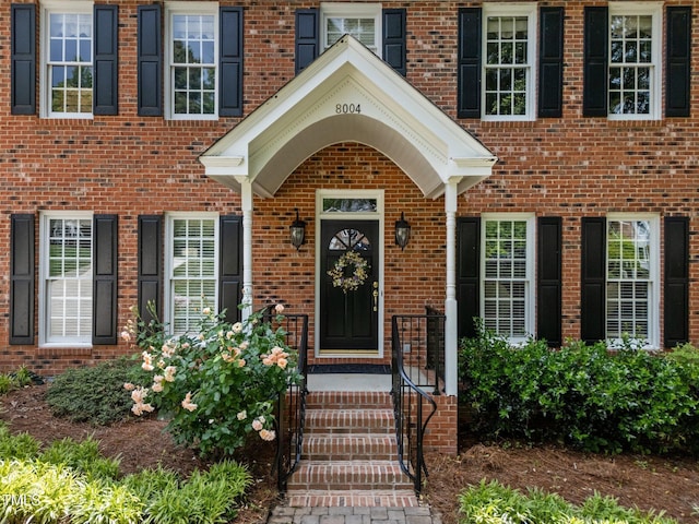 8004 Gabriels Bend Dr, Raleigh, NC 27612 - doorway to property featuring brick siding