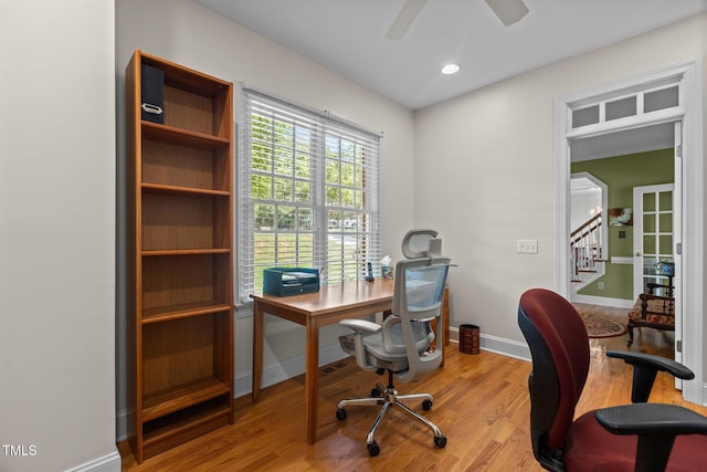 8004 Gabriels Bend Dr, Raleigh, NC 27612 - home office with wood finished floors, ceiling fan, and recessed lighting