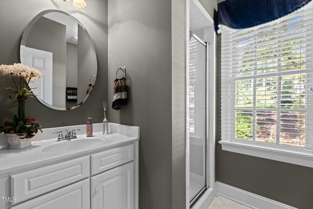 8004 Gabriels Bend Dr, Raleigh, NC 27612 - full bath with a shower stall, vanity, and tile patterned floors