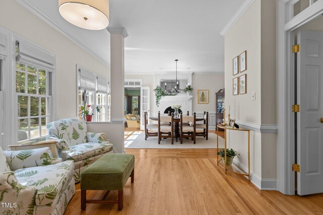 8004 Gabriels Bend Dr, Raleigh, NC 27612 - living area featuring ornamental molding and light wood-style flooring
