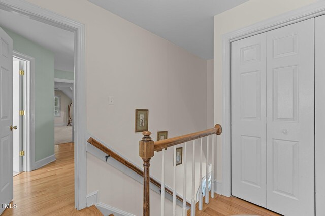 8004 Gabriels Bend Dr, Raleigh, NC 27612 - stairs featuring wood finished floors