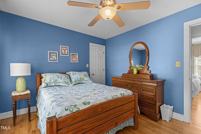 8004 Gabriels Bend Dr, Raleigh, NC 27612 - bedroom featuring wood finished floors and a ceiling fan