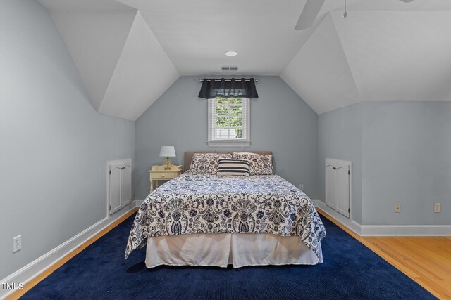 8004 Gabriels Bend Dr, Raleigh, NC 27612 - bedroom with wood finished floors, lofted ceiling, and ceiling fan
