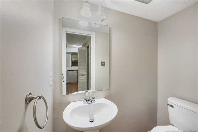 1255 Donaldson Ct, Cary, NC 27511 - bathroom with toilet and a sink