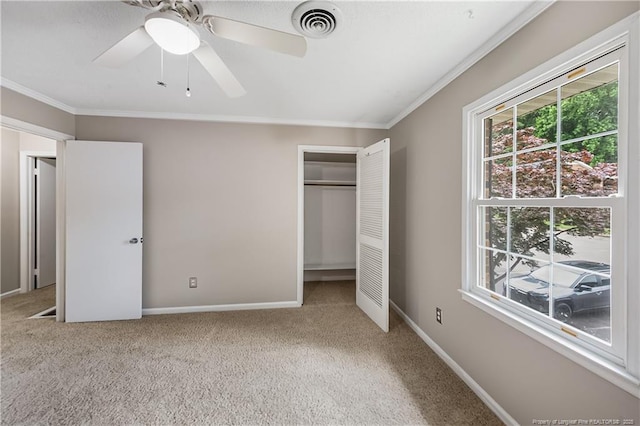 1255 Donaldson Ct, Cary, NC 27511 - unfurnished bedroom featuring crown molding, carpet floors, a closet, baseboards, and ceiling fan