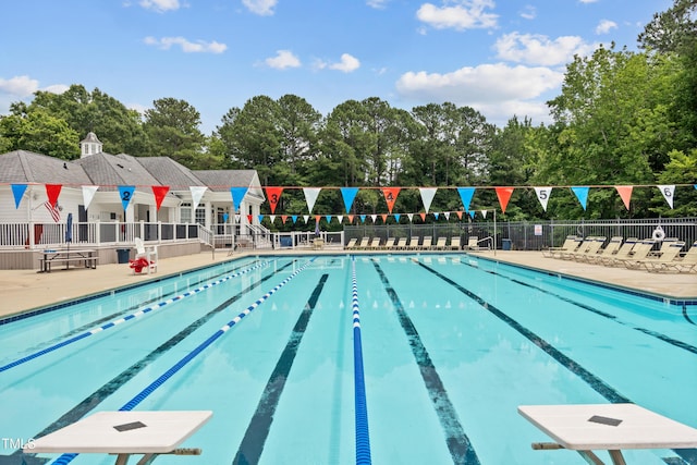 304 Gold Point Dr, Cary, NC 27519 - community pool with a patio and view of wooded area