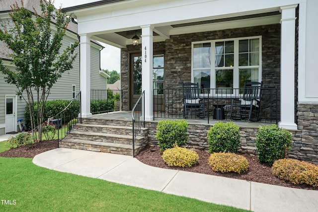 4104 Green Chase Way, Apex, NC 27539 - property entrance with covered porch and stone siding