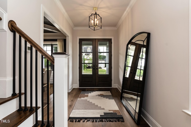 4104 Green Chase Way, Apex, NC 27539 - entryway with french doors, dark wood-style floors, a chandelier, crown molding, and stairs