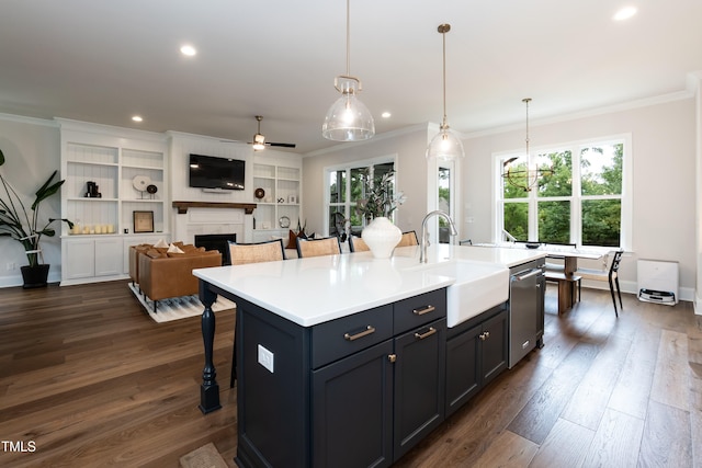 4104 Green Chase Way, Apex, NC 27539 - kitchen featuring ornamental molding, dishwasher, a ceiling fan, a fireplace, and dark wood-style flooring