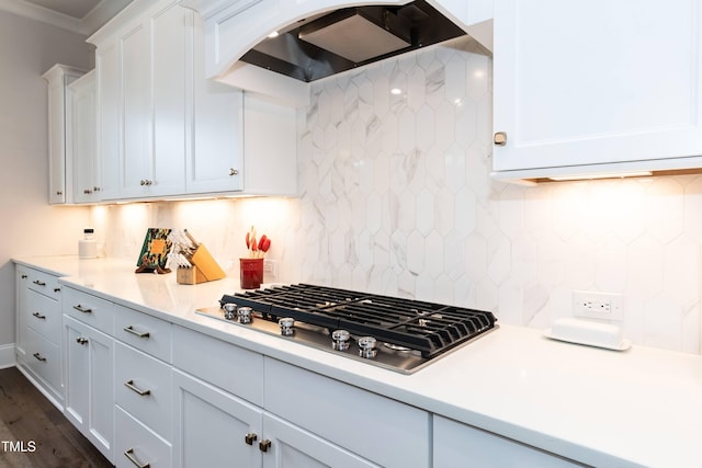 4104 Green Chase Way, Apex, NC 27539 - kitchen featuring custom exhaust hood, stainless steel gas cooktop, white cabinetry, light countertops, and ornamental molding