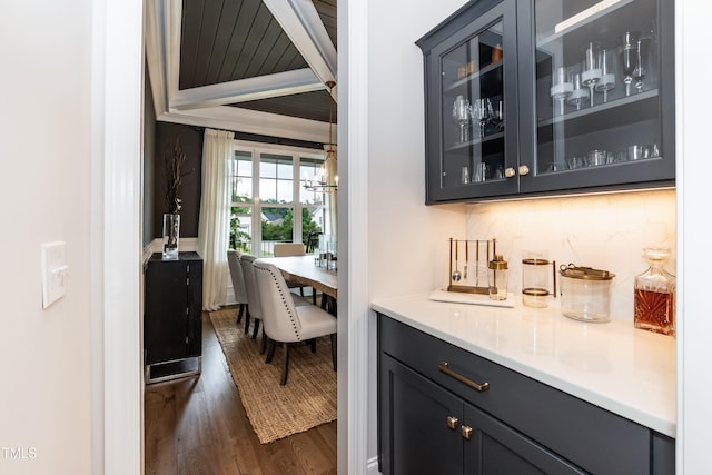 4104 Green Chase Way, Apex, NC 27539 - indoor bar featuring dark wood-style flooring and a chandelier
