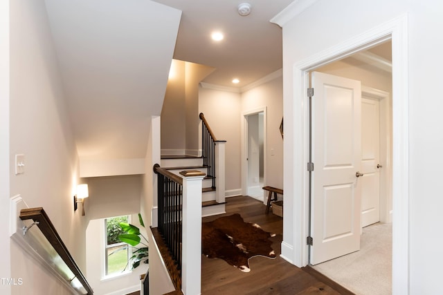 4104 Green Chase Way, Apex, NC 27539 - hall featuring an upstairs landing, wood finished floors, ornamental molding, and recessed lighting