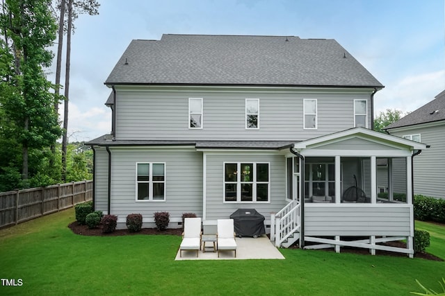 4104 Green Chase Way, Apex, NC 27539 - back of house featuring a patio area, a sunroom, and roof with shingles