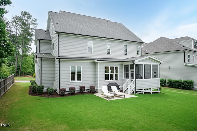 4104 Green Chase Way, Apex, NC 27539 - back of house with a shingled roof, a patio area, a yard, and a sunroom