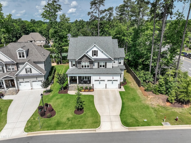 4104 Green Chase Way, Apex, NC 27539 - view of front of home featuring driveway, an attached garage, and a front lawn