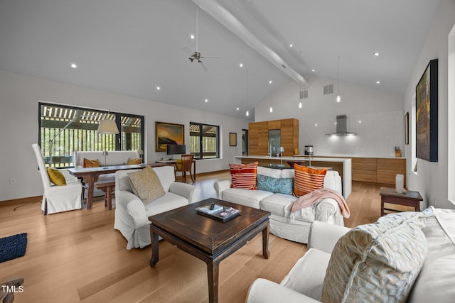 4725 Creeks Junction Rd, Blounts Creek, NC 27814 - living room with light wood finished floors, beam ceiling, a ceiling fan, high vaulted ceiling, and recessed lighting