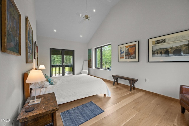 4725 Creeks Junction Rd, Blounts Creek, NC 27814 - bedroom featuring light wood-style flooring, high vaulted ceiling, recessed lighting, and access to exterior