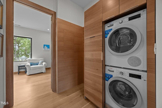 4725 Creeks Junction Rd, Blounts Creek, NC 27814 - laundry area with stacked washing machine and dryer and light wood-style floors