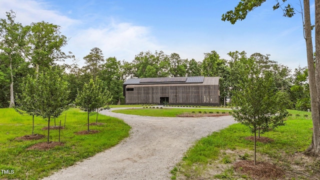 4725 Creeks Junction Rd, Blounts Creek, NC 27814 - view of home's community featuring an outdoor structure, curved driveway, and a pole building