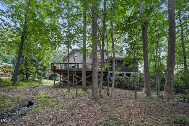 105 Gorge Ct, Cary, NC 27518 - rear view of house featuring a sunroom and a wooden deck