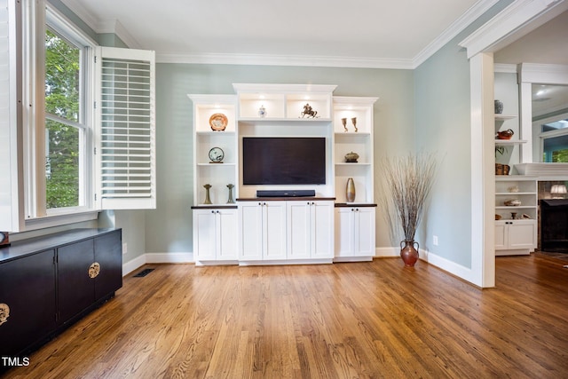 105 Gorge Ct, Cary, NC 27518 - unfurnished living room featuring light wood-type flooring and ornamental molding