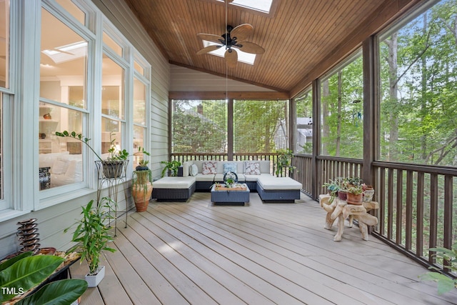 105 Gorge Ct, Cary, NC 27518 - sunroom featuring a skylight, an outdoor living space, vaulted ceiling, a ceiling fan, and healthy amount of natural light