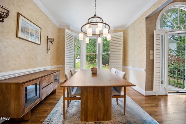 105 Gorge Ct, Cary, NC 27518 - dining area with wallpapered walls, crown molding, healthy amount of natural light, and dark wood-style flooring