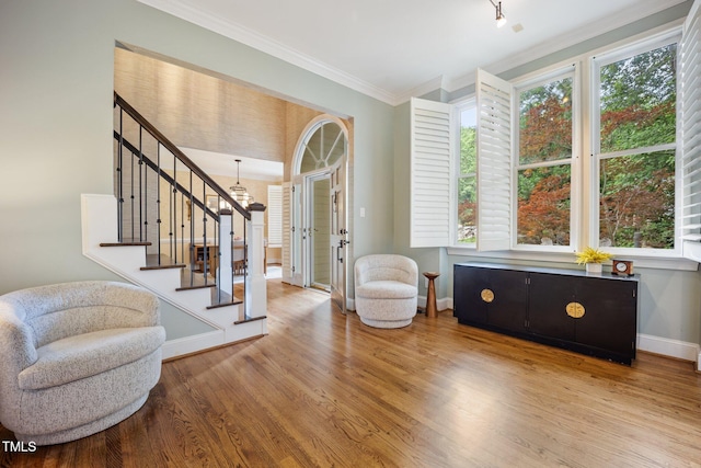 105 Gorge Ct, Cary, NC 27518 - entryway with stairs, wood finished floors, ornamental molding, and a chandelier