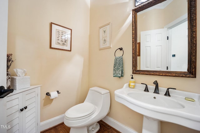 105 Gorge Ct, Cary, NC 27518 - half bath featuring toilet and wood finished floors