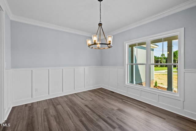 2237 Heartland Rd, Battleboro, NC 27809 - unfurnished room featuring a chandelier, crown molding, dark wood-type flooring, wainscoting, and a decorative wall