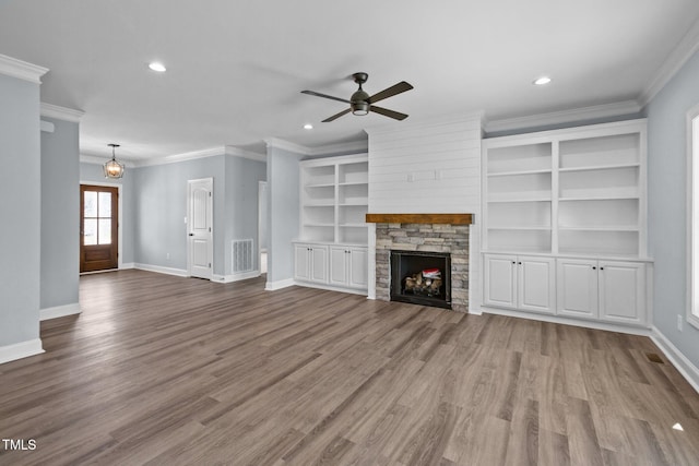 2237 Heartland Rd, Battleboro, NC 27809 - unfurnished living room with ceiling fan, baseboards, recessed lighting, wood finished floors, and ornamental molding