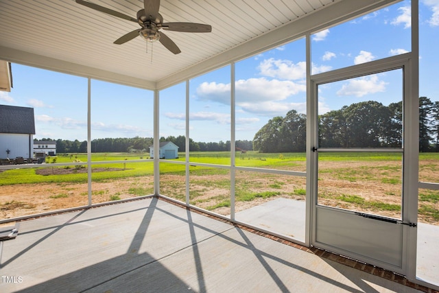 2237 Heartland Rd, Battleboro, NC 27809 - unfurnished sunroom with ceiling fan and a view of countryside