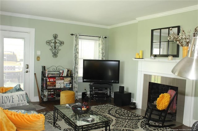 4903 Lemon Springs Rd, Sanford, NC 27332 - living area with crown molding, baseboards, a fireplace, and wood finished floors