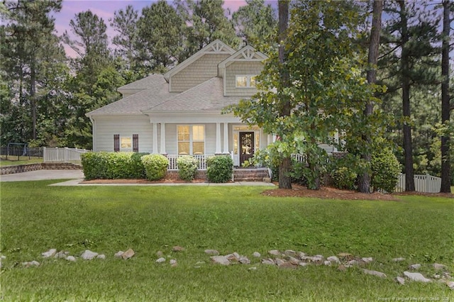 951 Whispering Pines Dr, Spring Lake, NC 28390 - craftsman house featuring a porch and a shingled roof