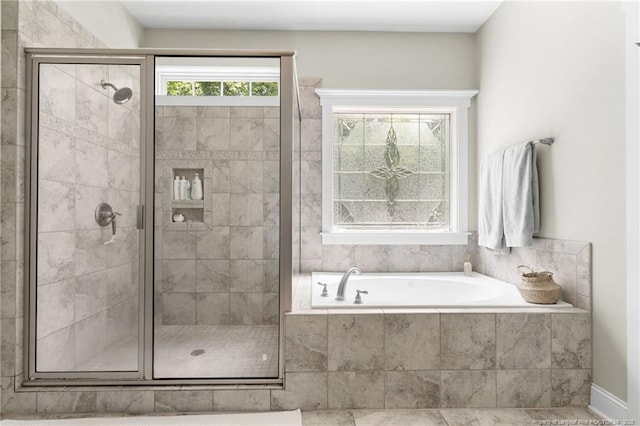 951 Whispering Pines Dr, Spring Lake, NC 28390 - bathroom featuring a stall shower and a bath