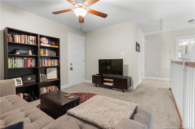 951 Whispering Pines Dr, Spring Lake, NC 28390 - carpeted living area with attic access, a ceiling fan, and baseboards