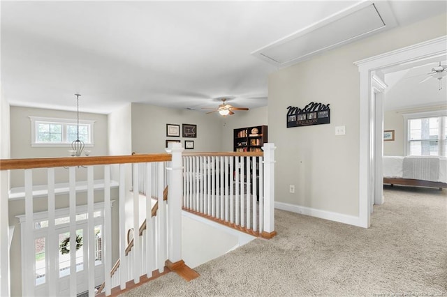 951 Whispering Pines Dr, Spring Lake, NC 28390 - hallway featuring attic access, carpet floors, an upstairs landing, and baseboards