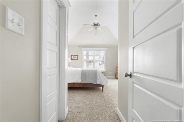 951 Whispering Pines Dr, Spring Lake, NC 28390 - bedroom with carpet floors, baseboards, lofted ceiling, and a ceiling fan