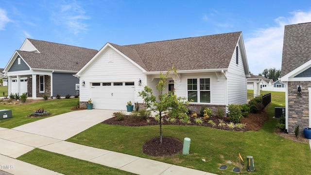 1319 Richfield Oaks Dr, Fuquay Varina, NC 27526 - view of front of property with a front yard, driveway, brick siding, a garage, and roof with shingles