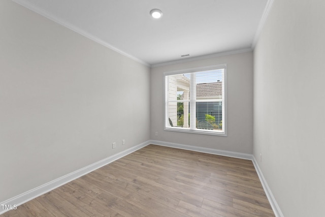 1319 Richfield Oaks Dr, Fuquay Varina, NC 27526 - empty room with crown molding and light wood-style floors