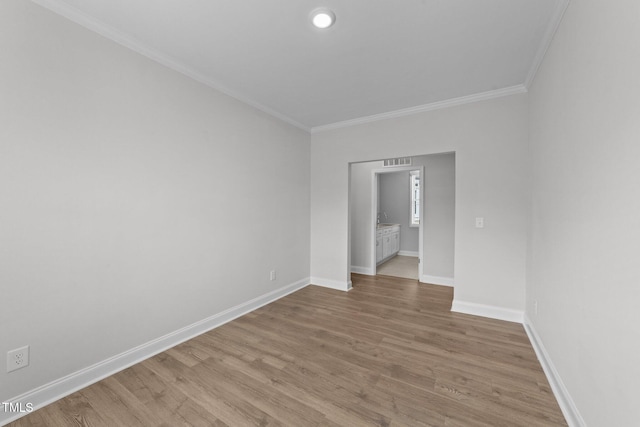 1319 Richfield Oaks Dr, Fuquay Varina, NC 27526 - unfurnished room with crown molding and wood finished floors