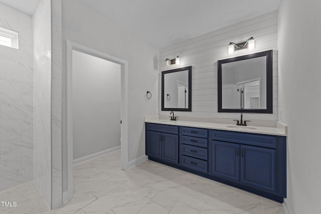 1319 Richfield Oaks Dr, Fuquay Varina, NC 27526 - bathroom with double vanity, marble look tiles, and a tile shower