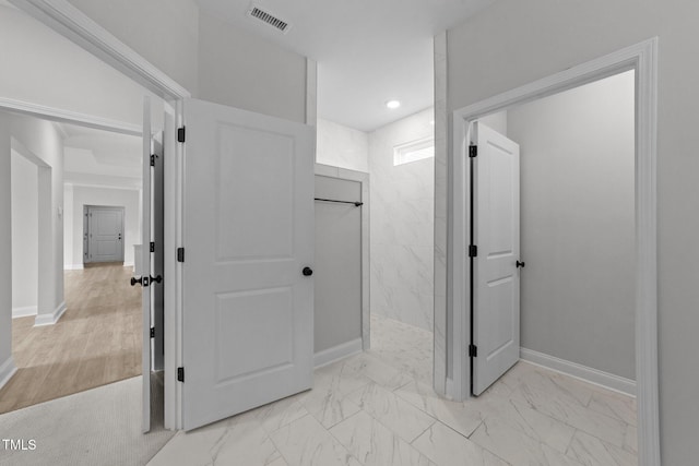 1319 Richfield Oaks Dr, Fuquay Varina, NC 27526 - bathroom featuring marble look tiles, a walk in shower, and recessed lighting