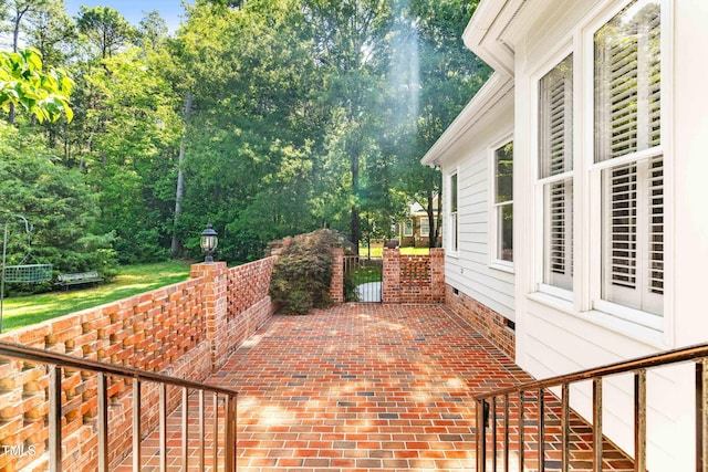 619 Baybush Dr, Raleigh, NC 27615 - view of patio / terrace featuring view of wooded area