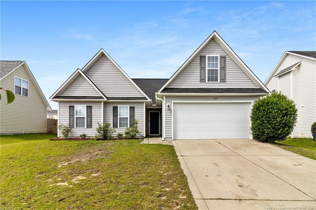 1217 Herring Gull Dr, Fayetteville, NC 28306 - traditional-style home featuring concrete driveway, a front lawn, and a garage