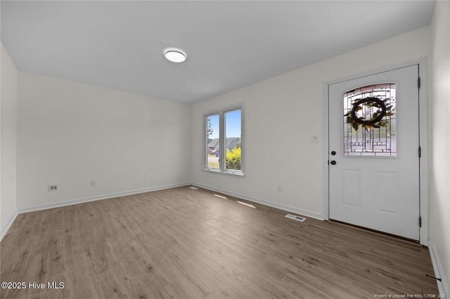 240 Eppingdale Dr, Spring Lake, NC 28390 - foyer with light wood finished floors and baseboards