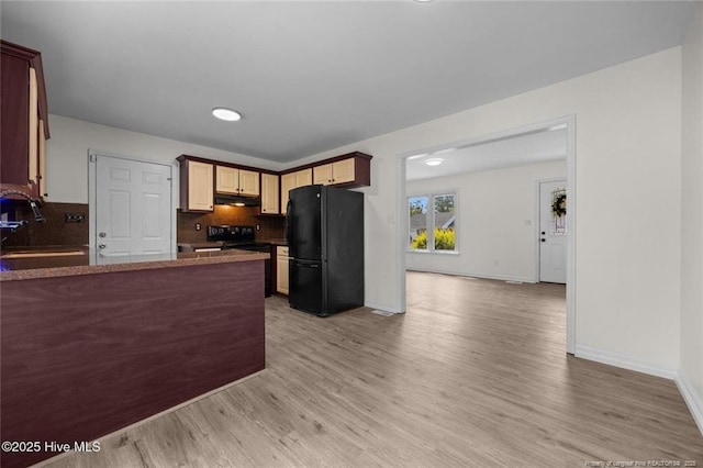 240 Eppingdale Dr, Spring Lake, NC 28390 - kitchen with black appliances, a sink, decorative backsplash, light wood-type flooring, and recessed lighting