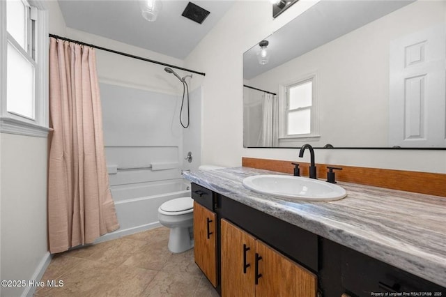 240 Eppingdale Dr, Spring Lake, NC 28390 - full bathroom featuring vanity, shower / tub combo with curtain, toilet, and baseboards