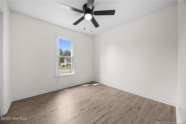 240 Eppingdale Dr, Spring Lake, NC 28390 - unfurnished room with wood finished floors, baseboards, and ceiling fan